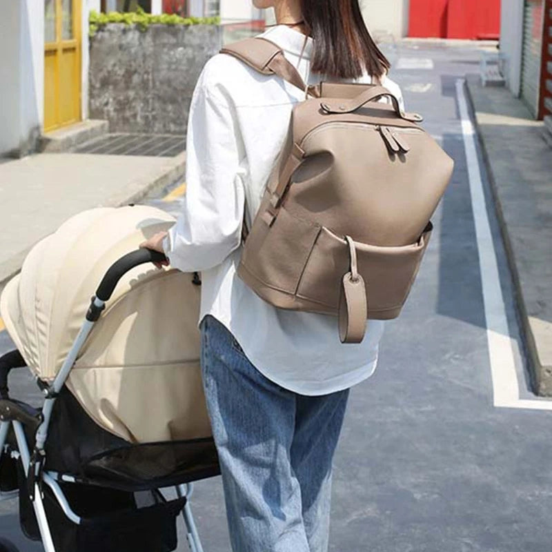 MamaBloom's multifunctional Grab N Go Diaper Backpack